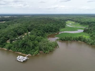 Overhead picture of Rice River Center, looking over wetlands, field station, and lake.